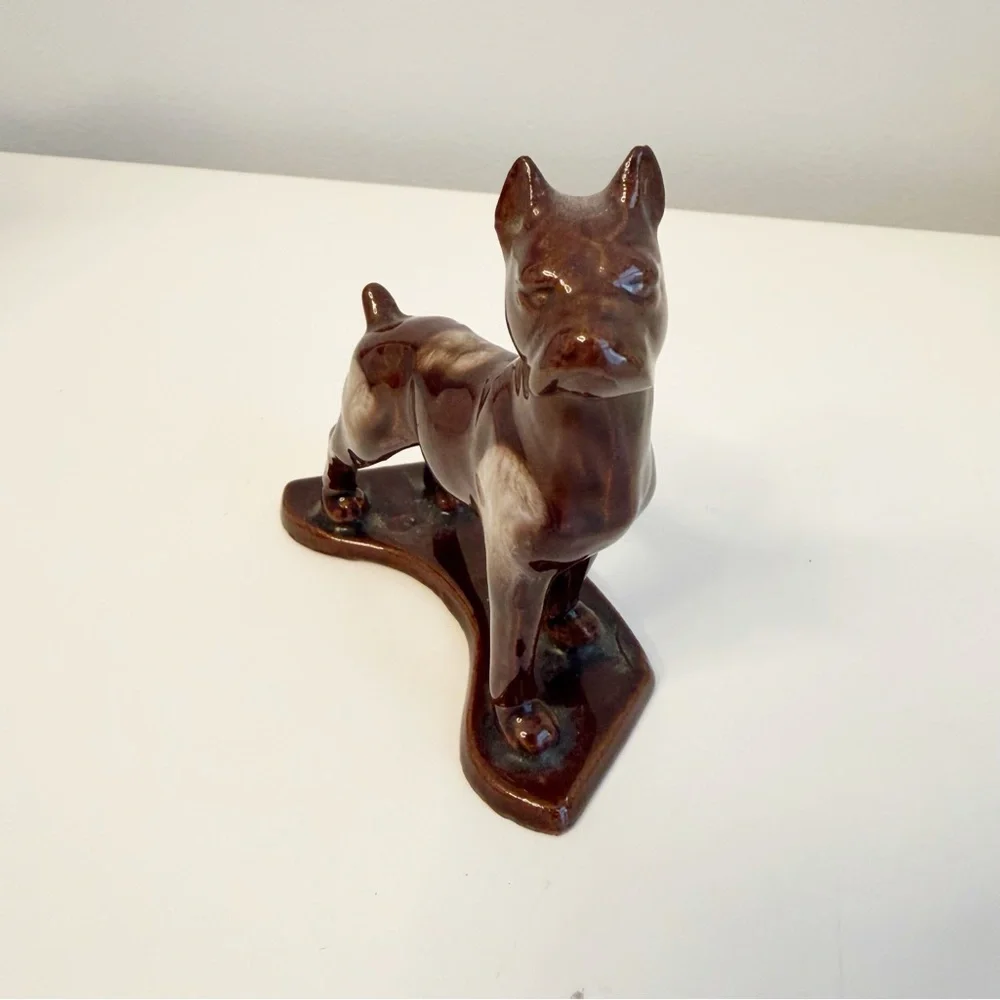 Vintage boxer dog ceramic statue.